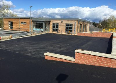 Civils and groundwork with asphalt road surfacing.