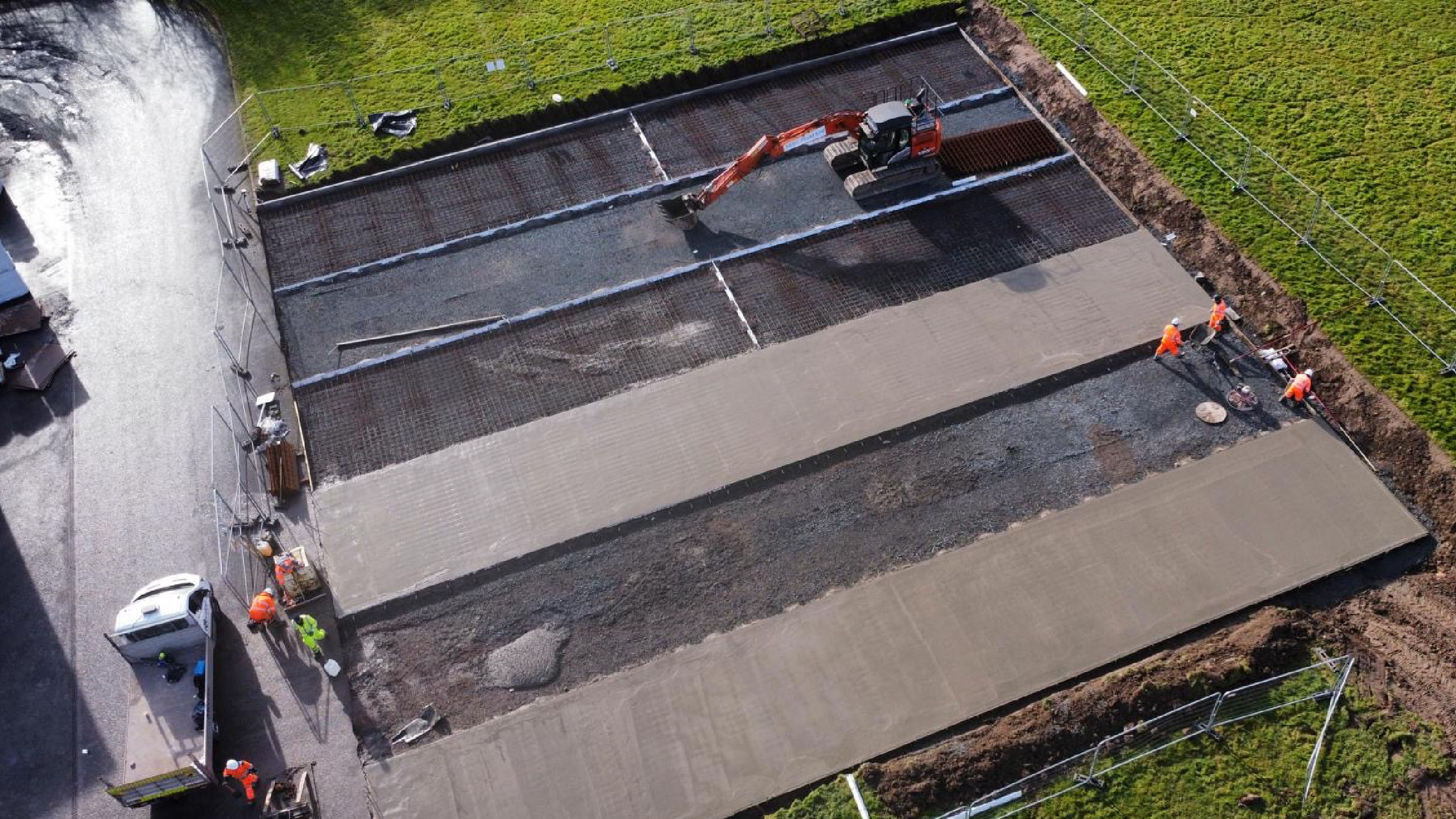 Installation of heavy duty concrete slab with machinery by MAC Groundworks