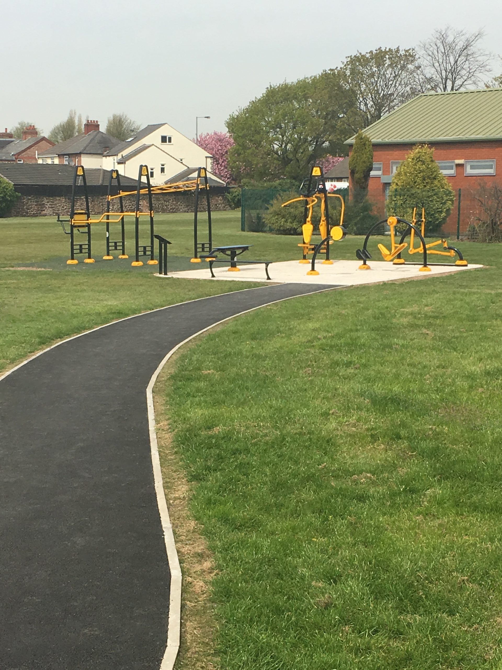 Outdoor Gym and Asphalt Footpath Installation - MAC Groundwork Contractors Ltd Pathway - public footpath to outdoor gym installation with yellow and green bars for circuit training.